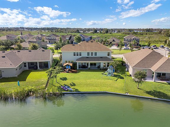 Large backyard with sea wall
