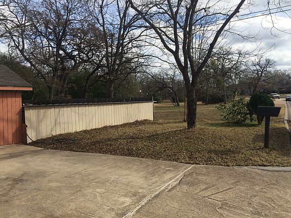 On driveway looking at park