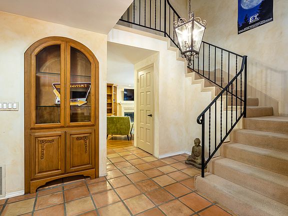 Entry way leading to ground level and upstairs rooms