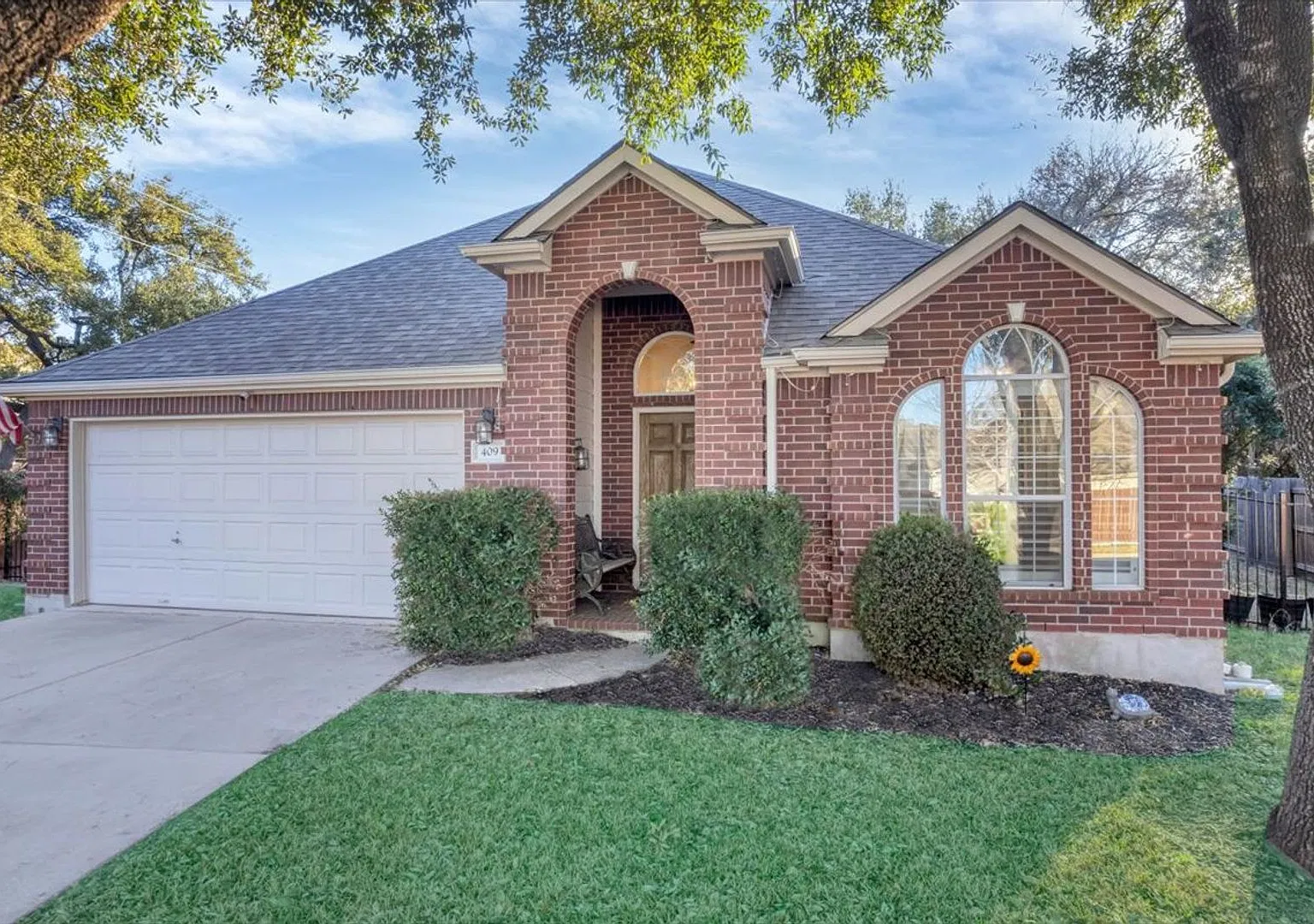 Charming one story home backing greenbelt — Photo 1