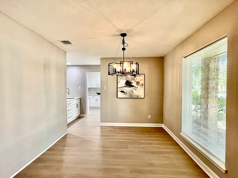 This elegant formal dining area is the perfect setting for hosting memorable gatherings, from festive family dinners to special celebrations with friends.
