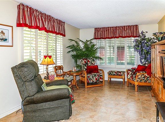 Living Room windows bring in lots of light.