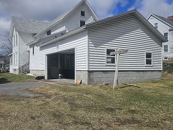 Rear View and 2 stall Garage