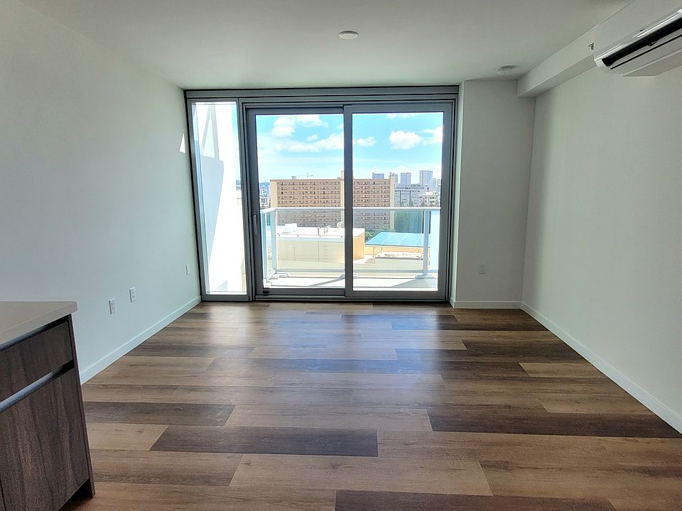 Studio Unit with a balcony and split air conditioner