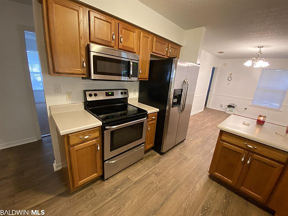 5th image of 6631 Woodside Ct E