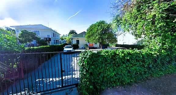 Gated backyard entrance near USC campus - secure outdoor space for international students