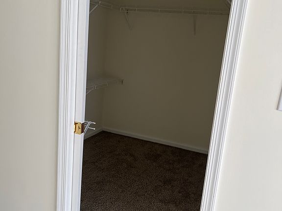 walk in closet with pocket door