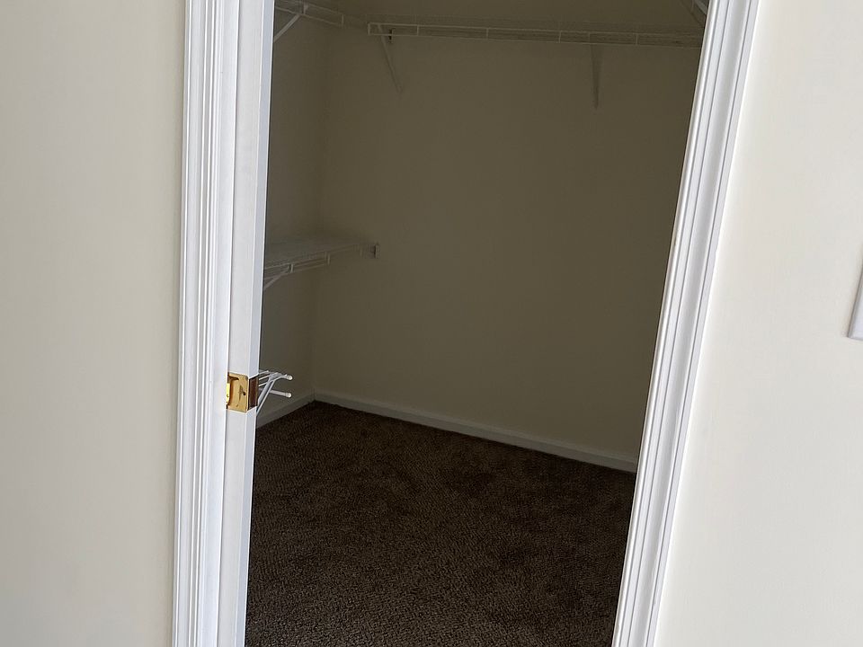 walk in closet with pocket door