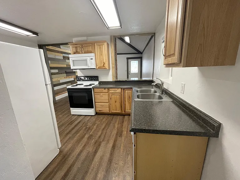 Kitchen from the versatile room and back entrance
