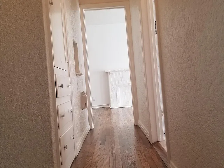 MORE BUILT IN STORAGE IN THE HALLWAY