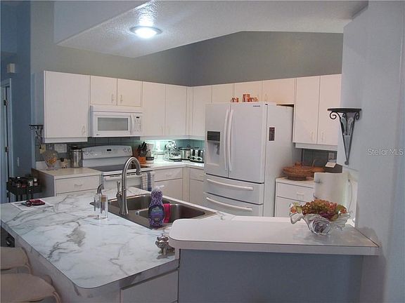 5th image of 14334 Teasdale Ave