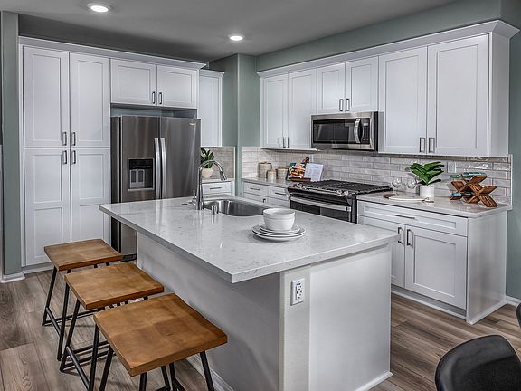 Residence 3 interior image modeled at a nearby Meritage community.