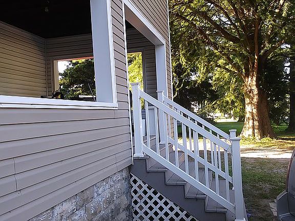 New vinyl front porch steps 