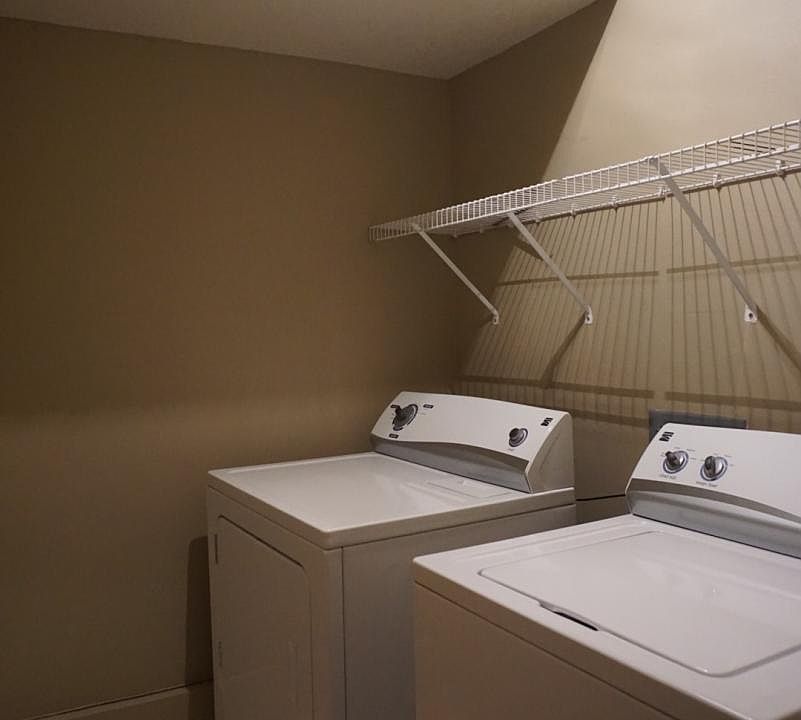 Laundry, just inside from garage