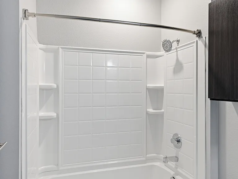 Bright and thoughtfully-designed bathrooms made for daily ease.
