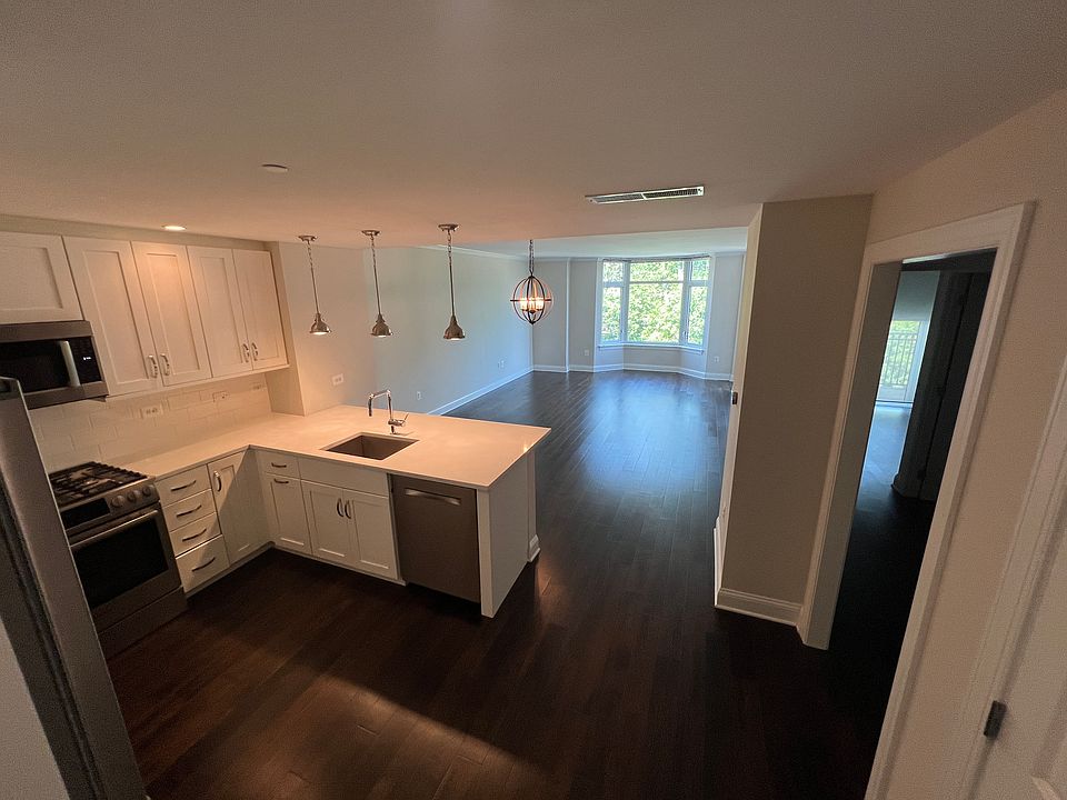 Entry View: Kitchen into Living Room