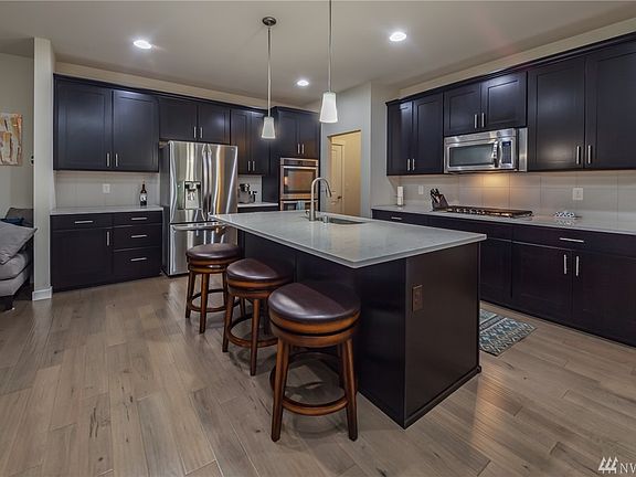 Large kitchen includes eating bar