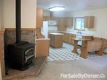 Kitchen, and wood stove.