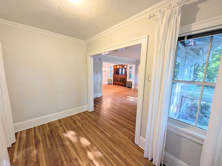 View from sunroom towards living and dining room