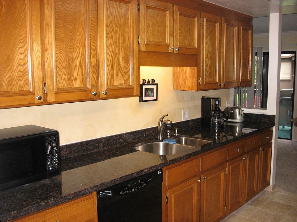 Remodeled Kitchen Granite,Travertine floors