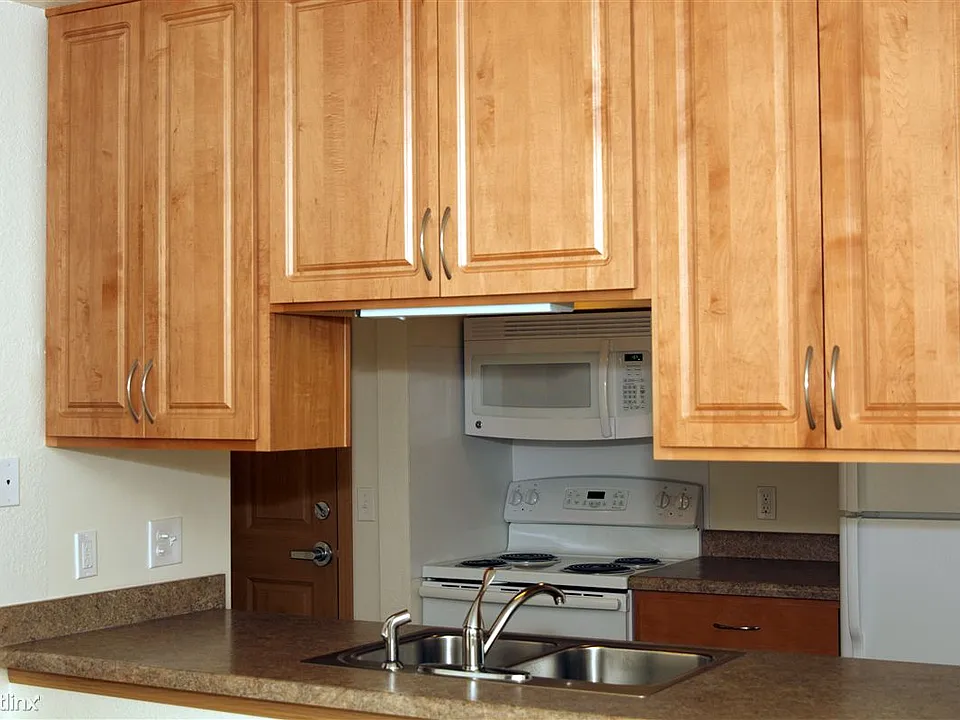 Double sided, extra tall, all wood cabinets.