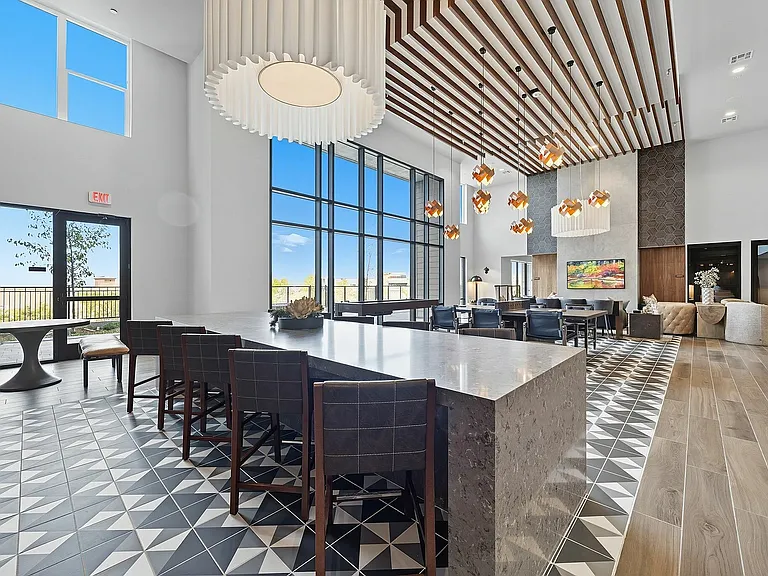 Gather with neighbors in your stylish community lounge