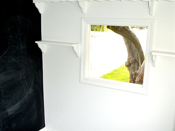 Shabby Chic shelving inside Carpeted Playhouse