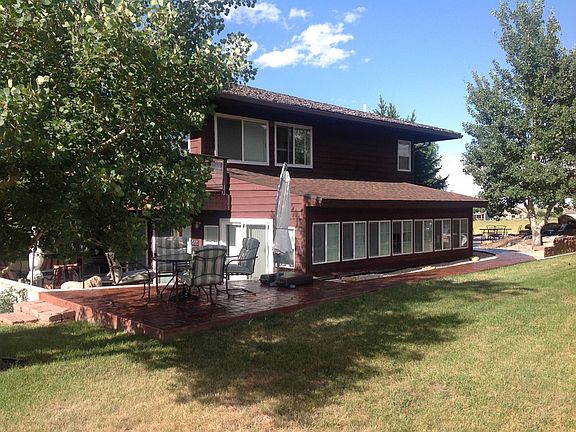 South Side of House
						:
						South view towards front yard and double waterfall.