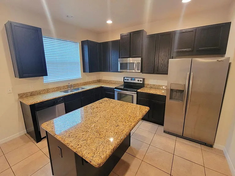 9571 Silver Buttonwood St — Photo 16