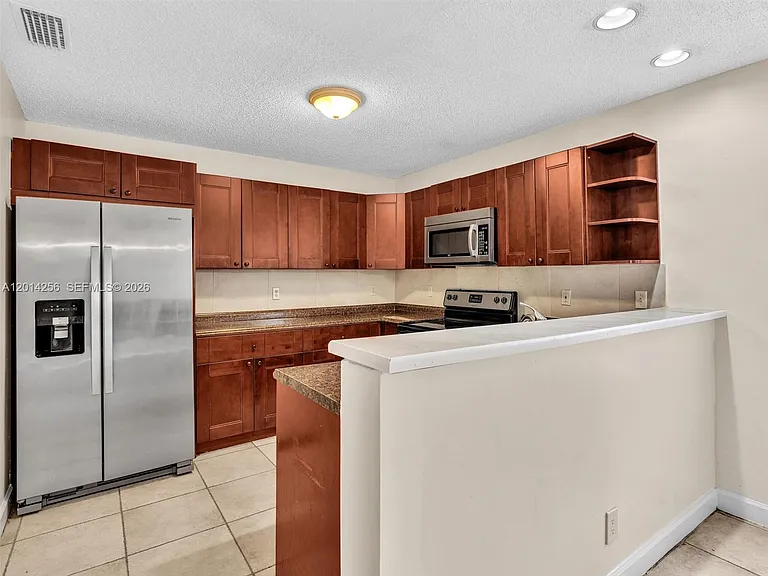 10731 NW 16th Ct — Photo 15