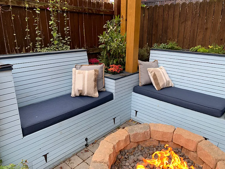Backyard seating and natural gas fire pit with built in planters