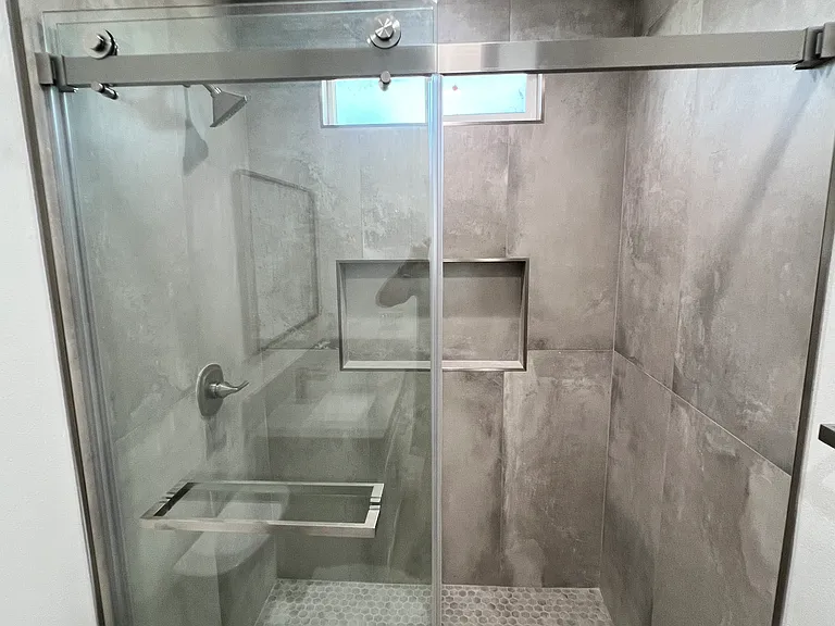 Shared Bathroom: Luxury tile shower