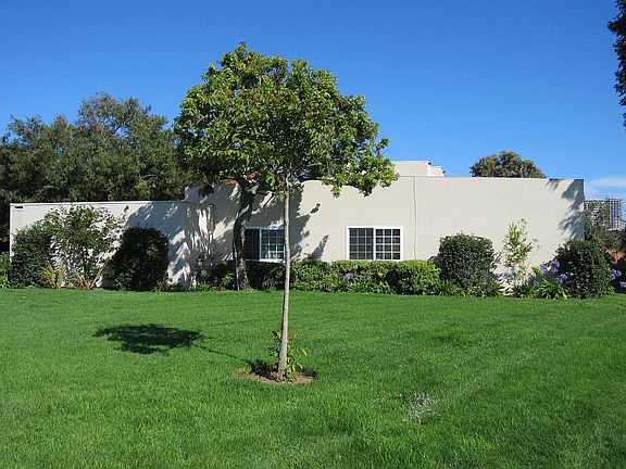 side facing greenbelt