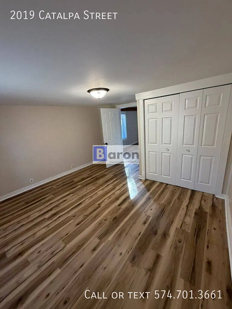 "Charming 4-Bed Home with Gleaming Hardwood Floors at 2019 Catalpa St, South Bend!" — Photo 3