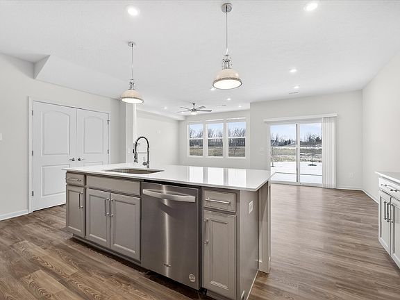 Gourmet kitchen with tons of natural light, HUGE island and tons of cabinetry