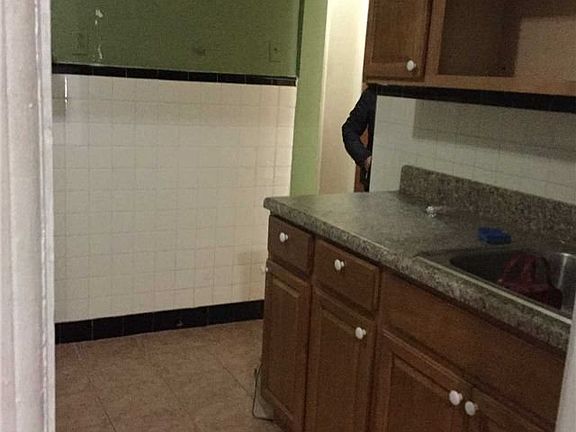 4th image of 11318 Atlantic Ave