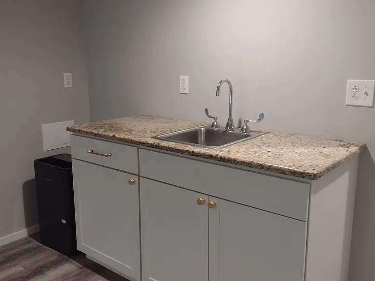 Basement bar sink cabinet