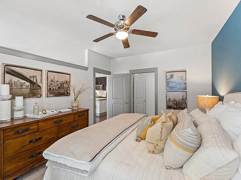 Large bedrooms feature 9-foot ceilings with ceiling fans