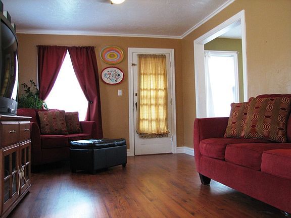 Bright living room with access to backyard.