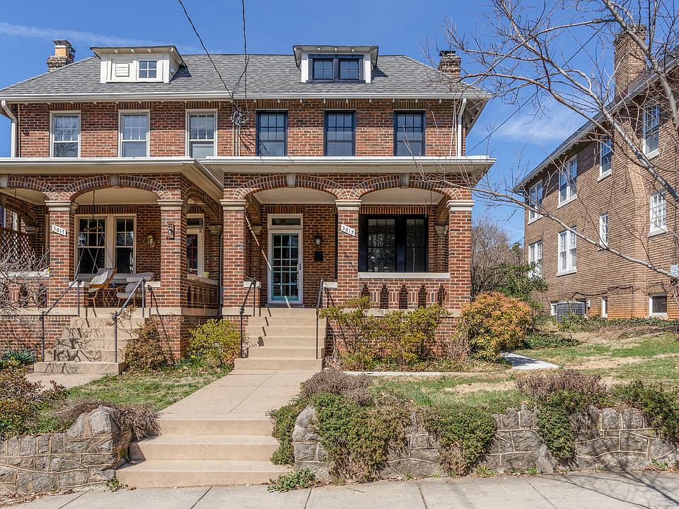 Semi-detached home with inviting front porch