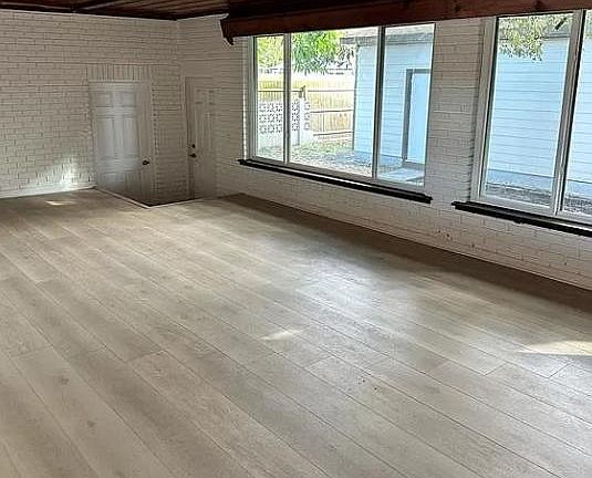 Big Florida room with new large windows.