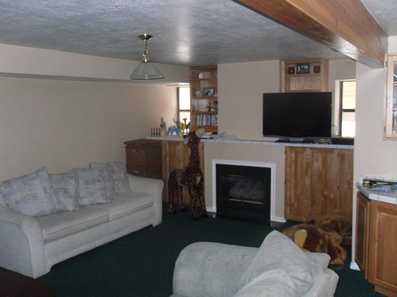 finished basement with gas fireplace