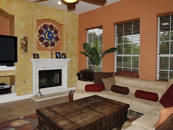 Family room with cozy fireplace.