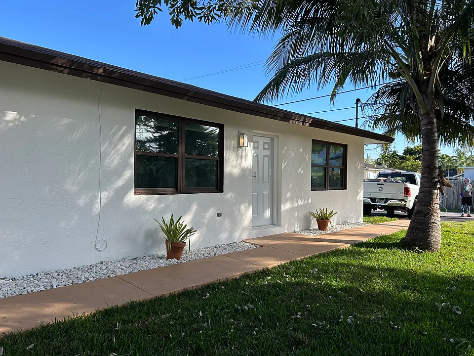 Front view of the unit. Private parking lot is to the right (just shared with the other duplex unit)