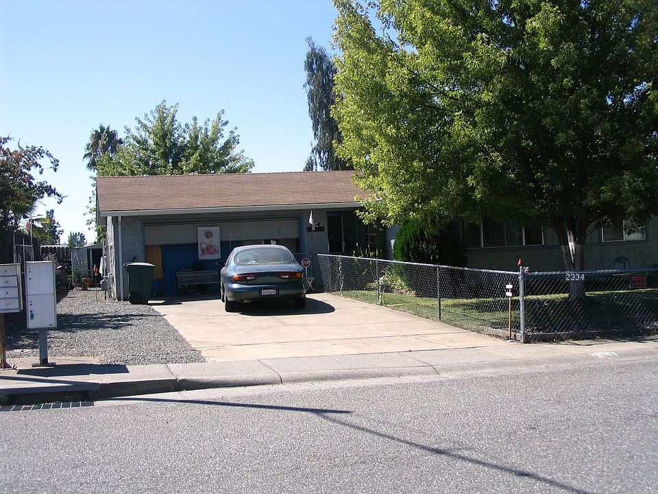 Front of house and garage with RV/Boat access
