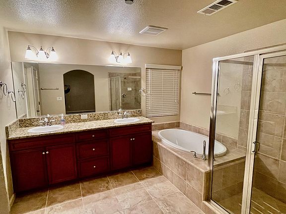 Large master bath with tub and standing shower