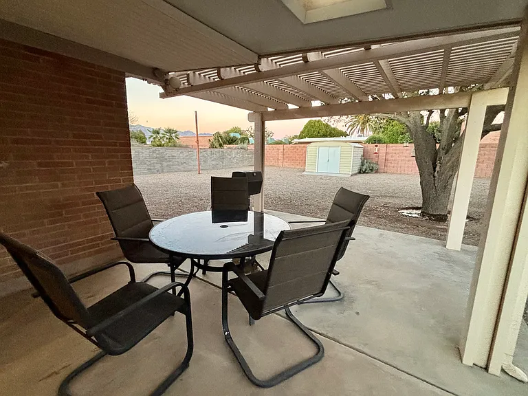 patio, large yard and shed