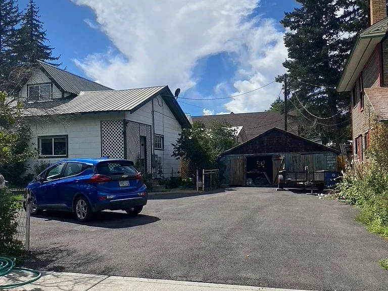 Private parking lot- you get one car spot.