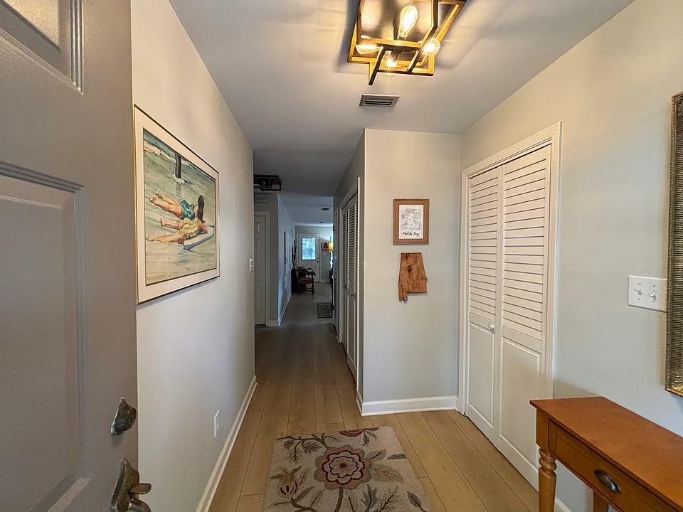 Entry way. The doors on the right are to the laundry room.