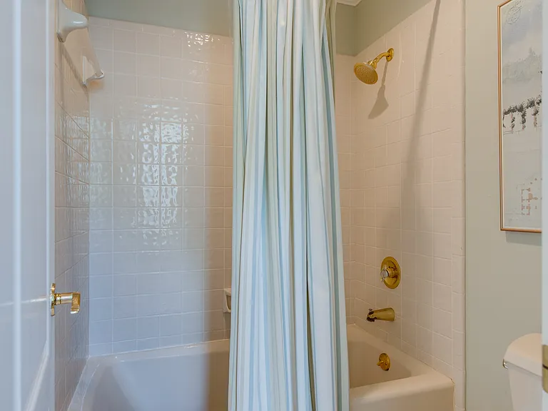 Second bathroom with separate lavatory and shower/tub